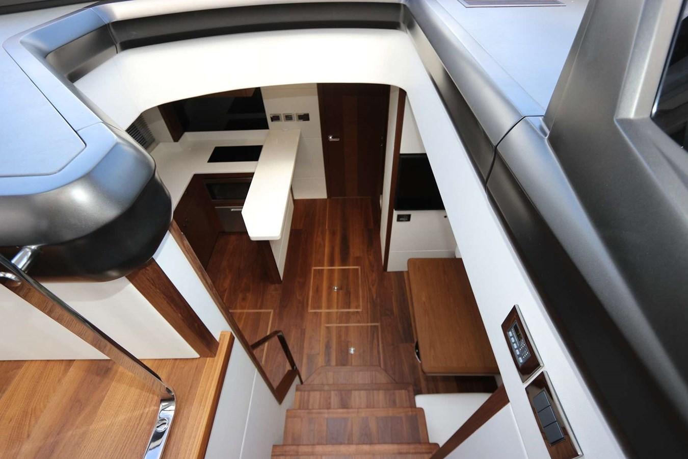a staircase with a wood floor aboard LYDIA SWAG Yacht for Sale