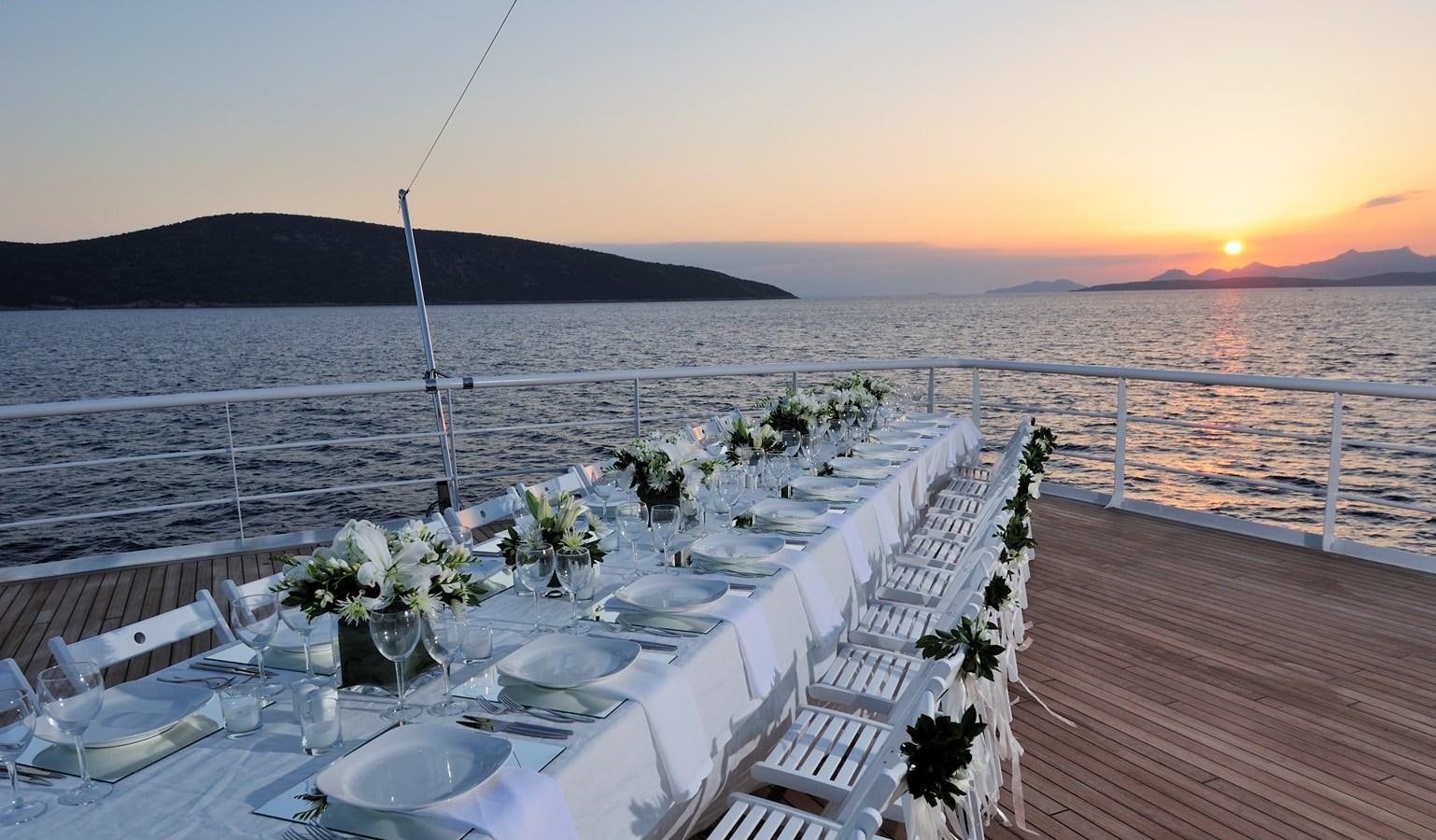 a table set for a wedding aboard 2011 CUSTOM PASSENGER CRUISE SHIP Yacht for Sale