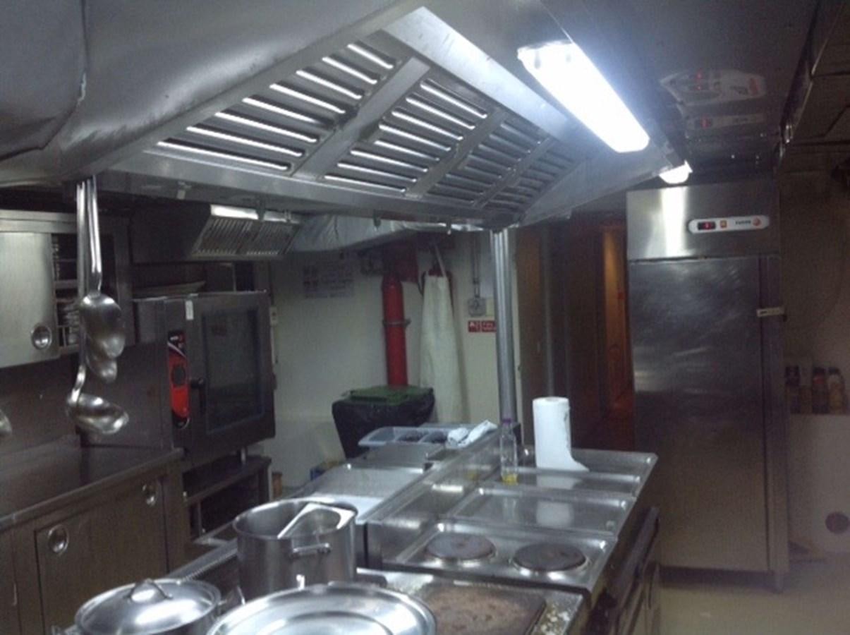 a kitchen with a lot of dirty dishes aboard 2011 CUSTOM PASSENGER CRUISE SHIP Yacht for Sale