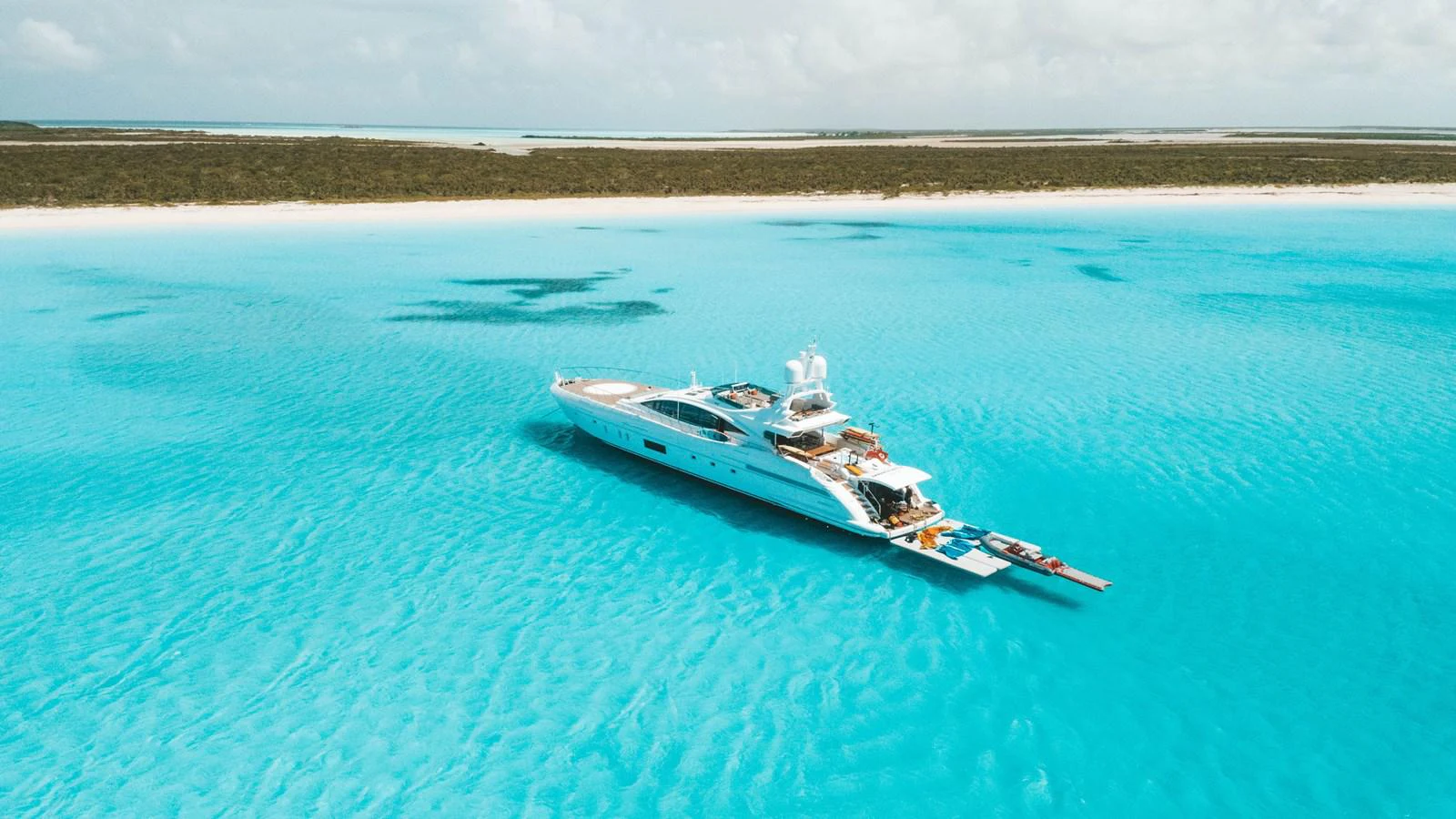 a boat in the water aboard MANGUSTA Yacht for Sale