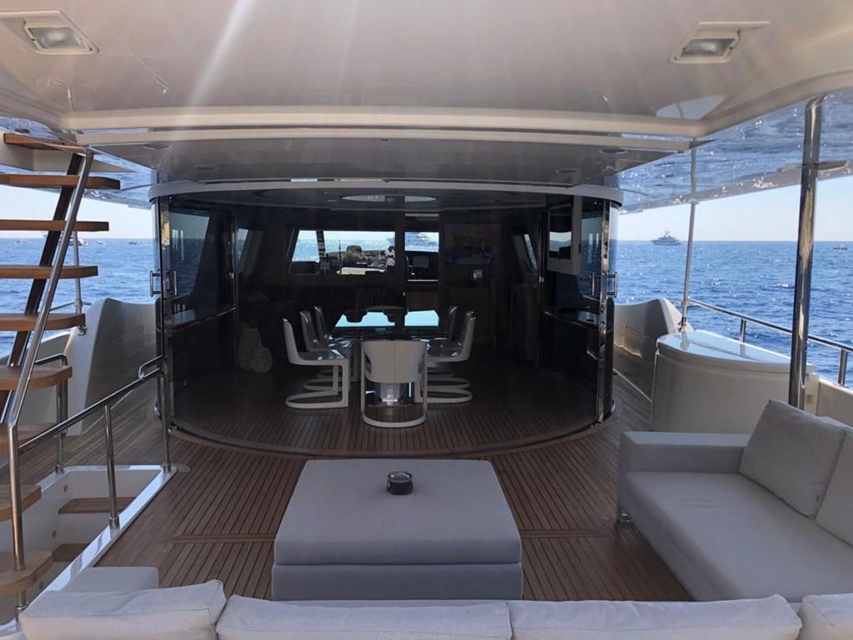 a boat with a table and chairs aboard NAVETTA 33 CRESCENDO Yacht for Sale