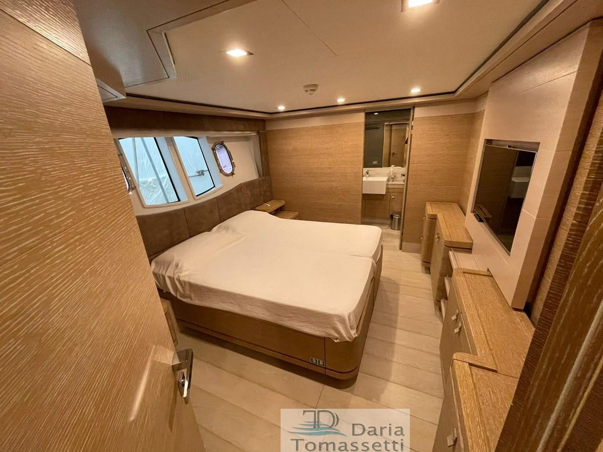 a hotel room with a bed aboard NAVETTA 33 CRESCENDO Yacht for Sale