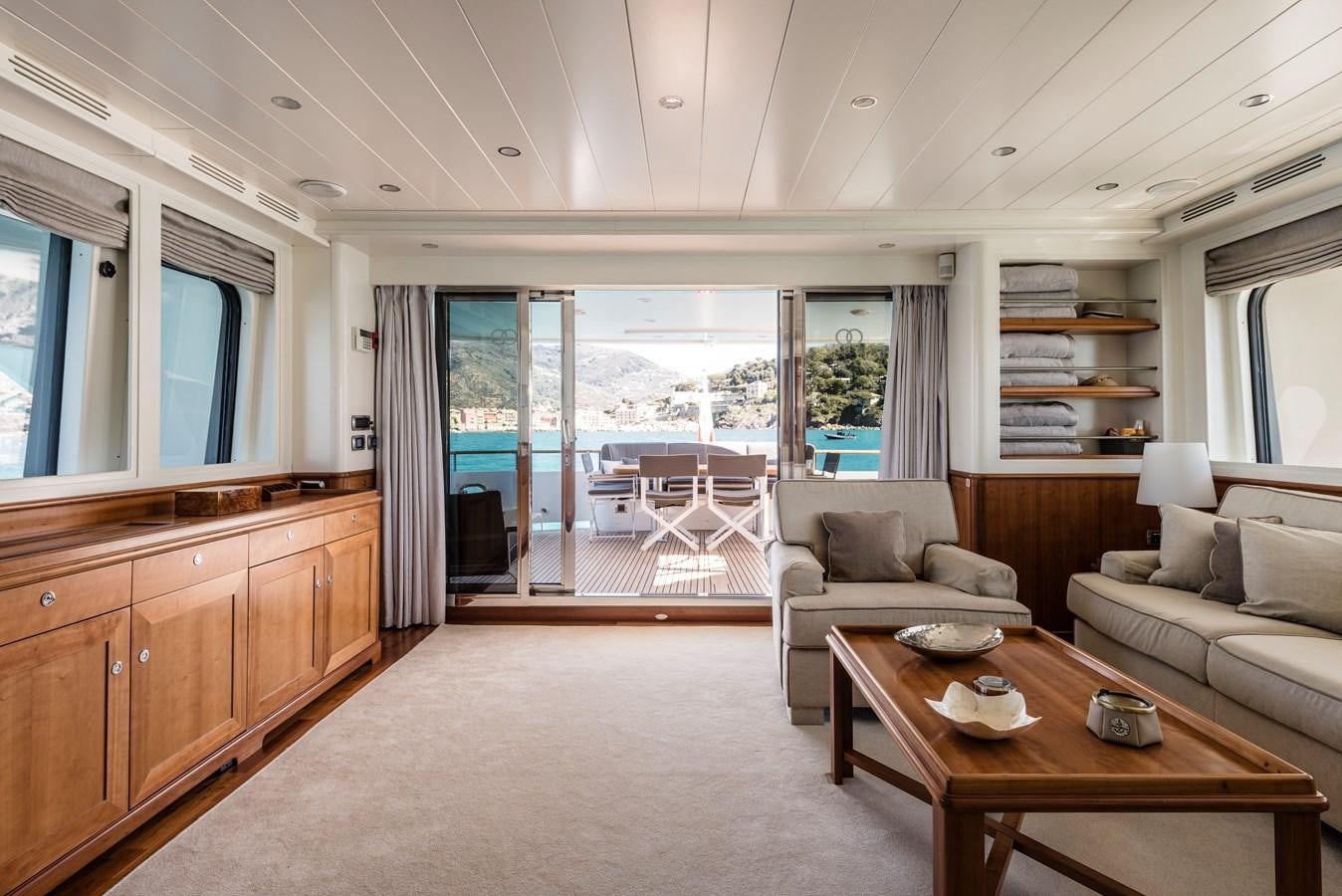 a living room with a large window aboard ARCHIPELAGO Yacht for Sale