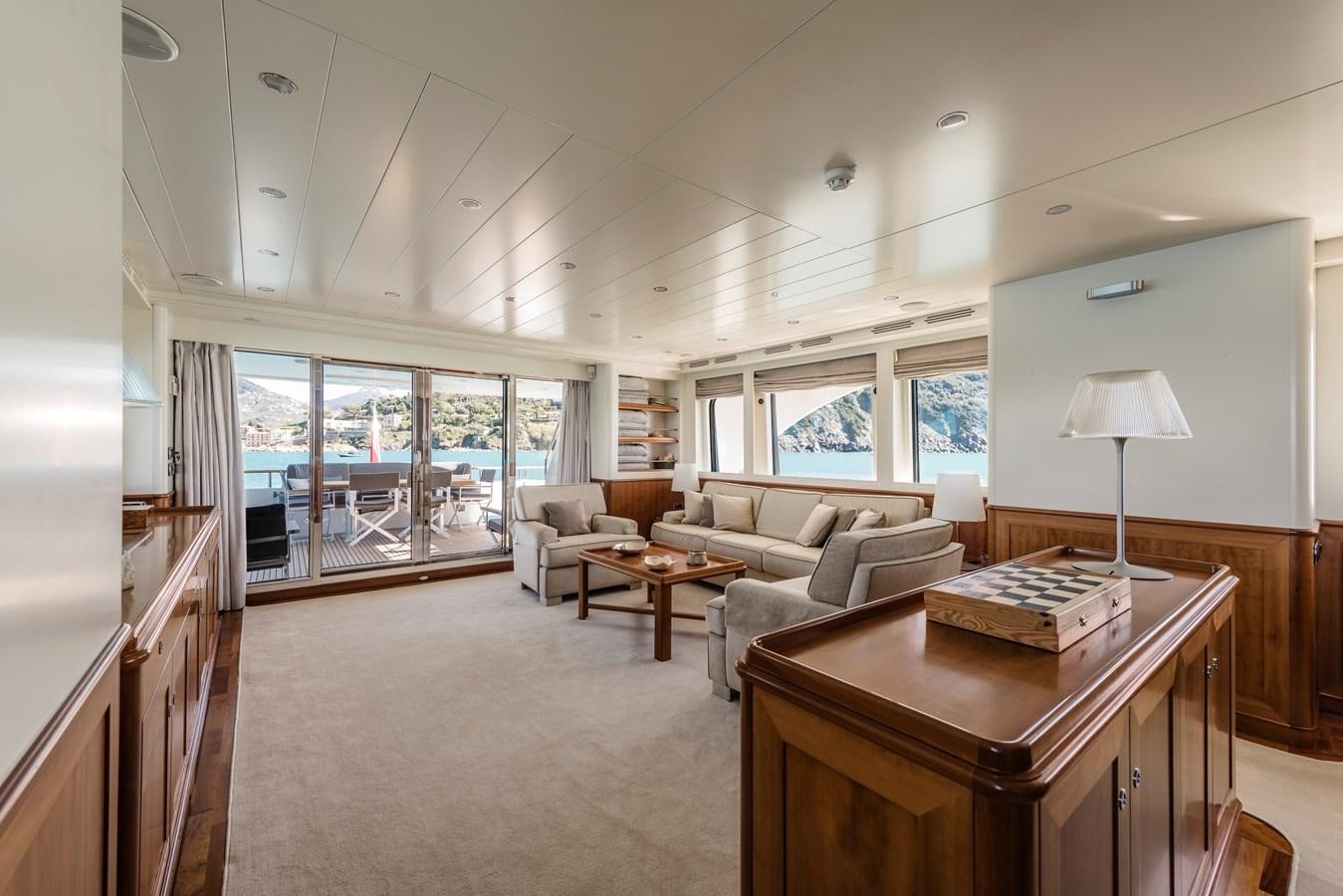 a living room with a large window aboard ARCHIPELAGO Yacht for Sale