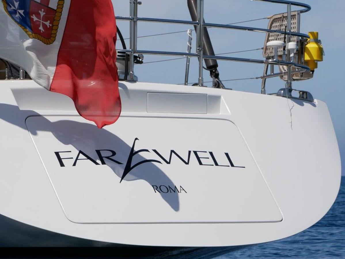 a white surfboard with a blue and white surfboard aboard STARFALL Yacht for Sale