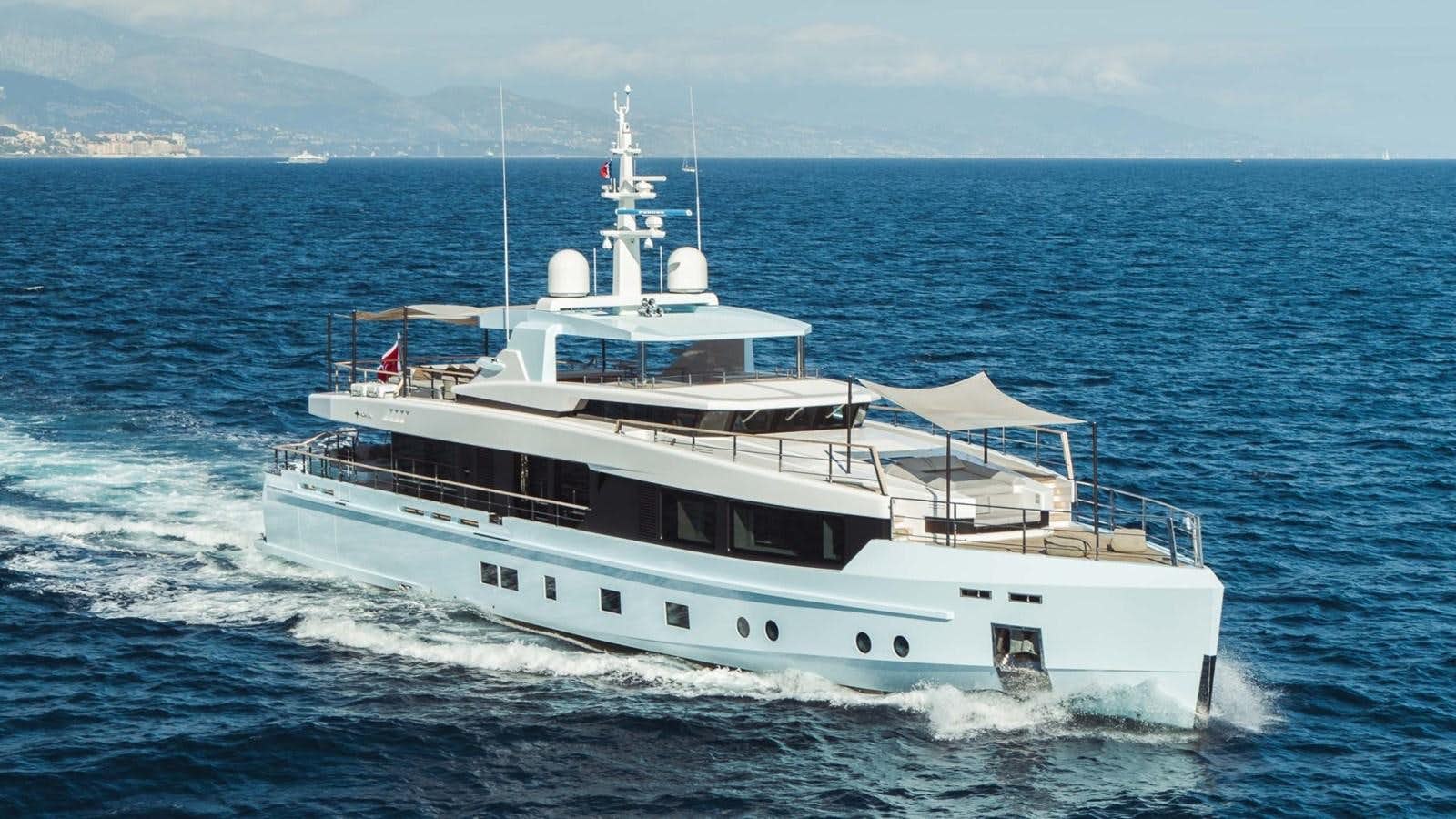 a large white boat in the water aboard JESMA II Yacht for Sale