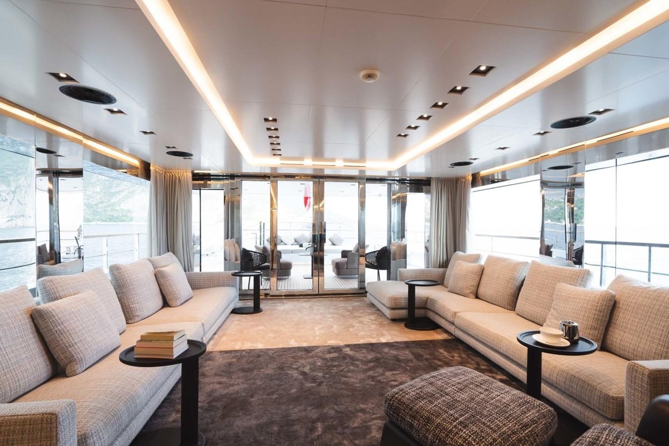 a living room with a large window aboard JESMA II Yacht for Charter