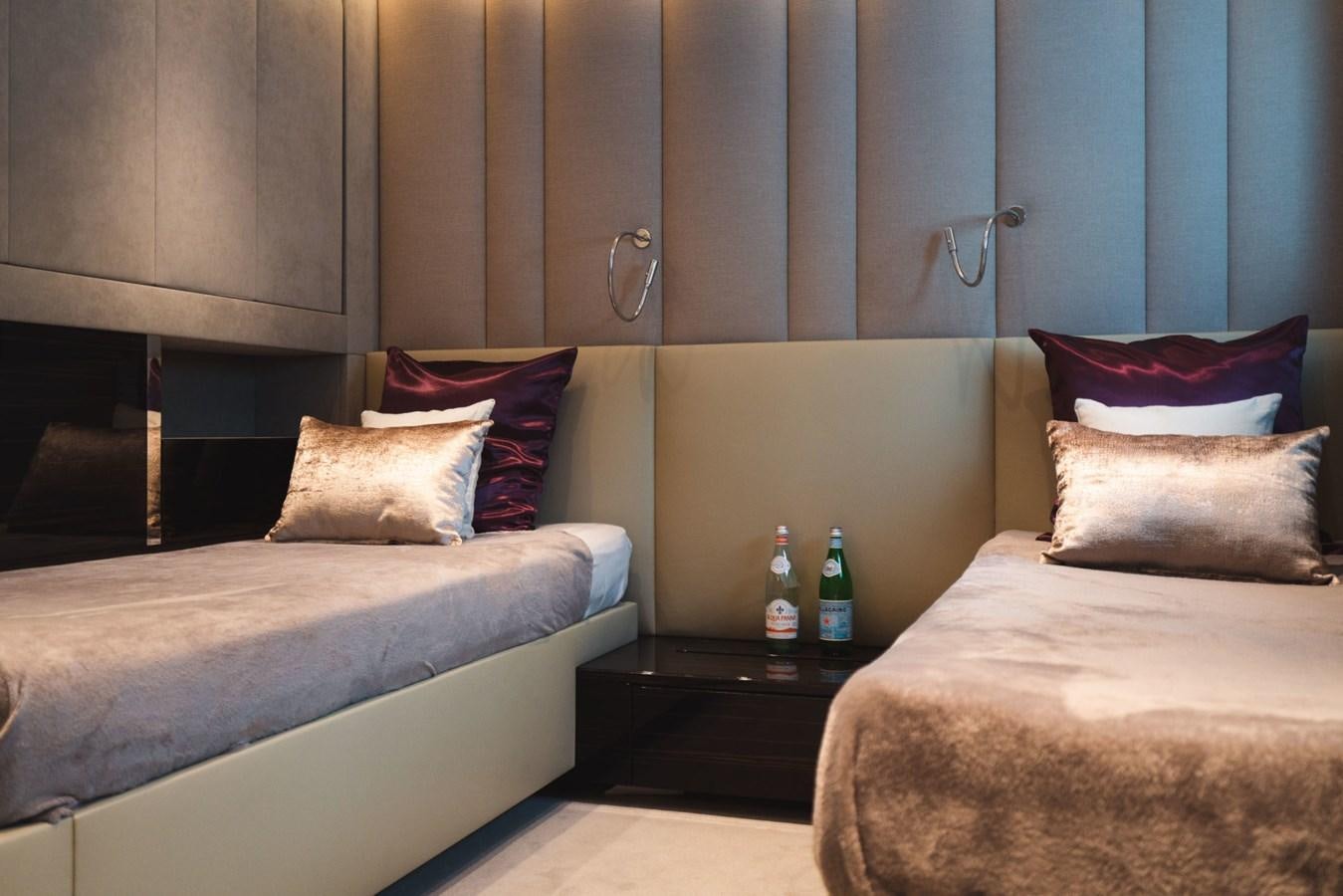 a room with two beds aboard JESMA II Yacht for Charter
