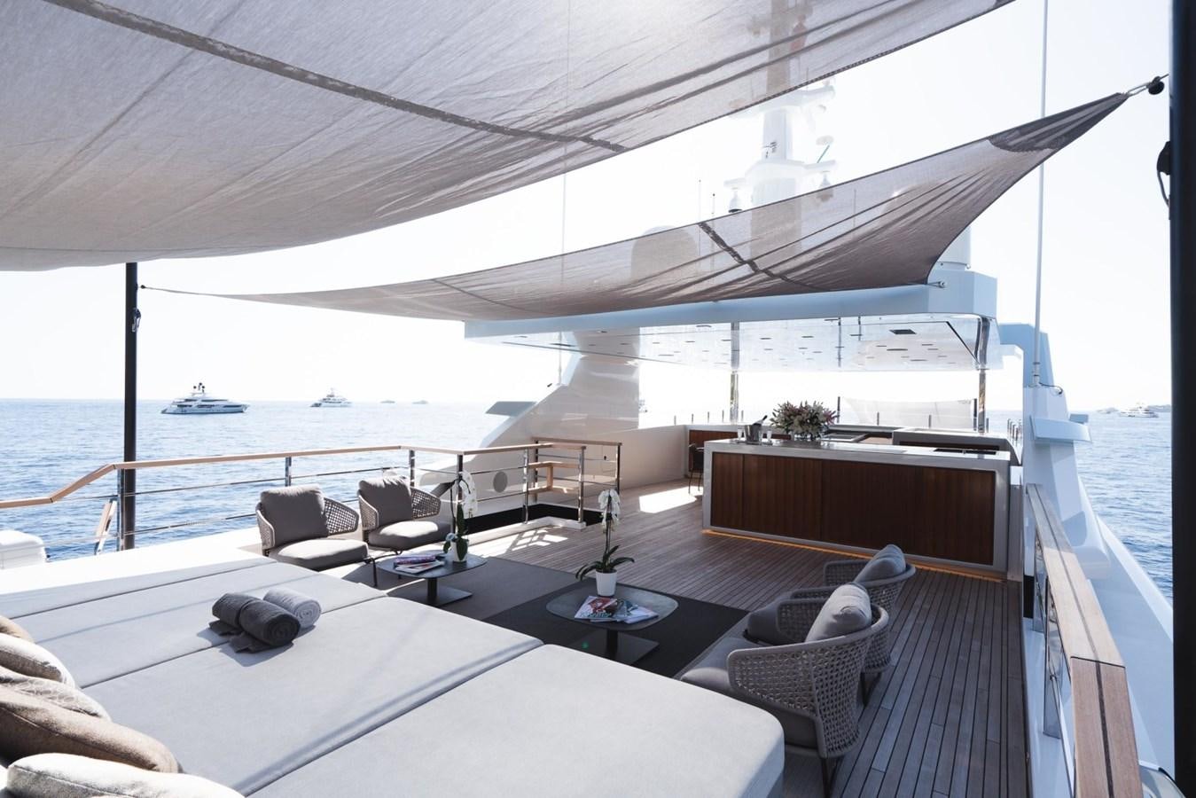 a deck with a view of the ocean and the deck aboard JESMA II Yacht for Charter