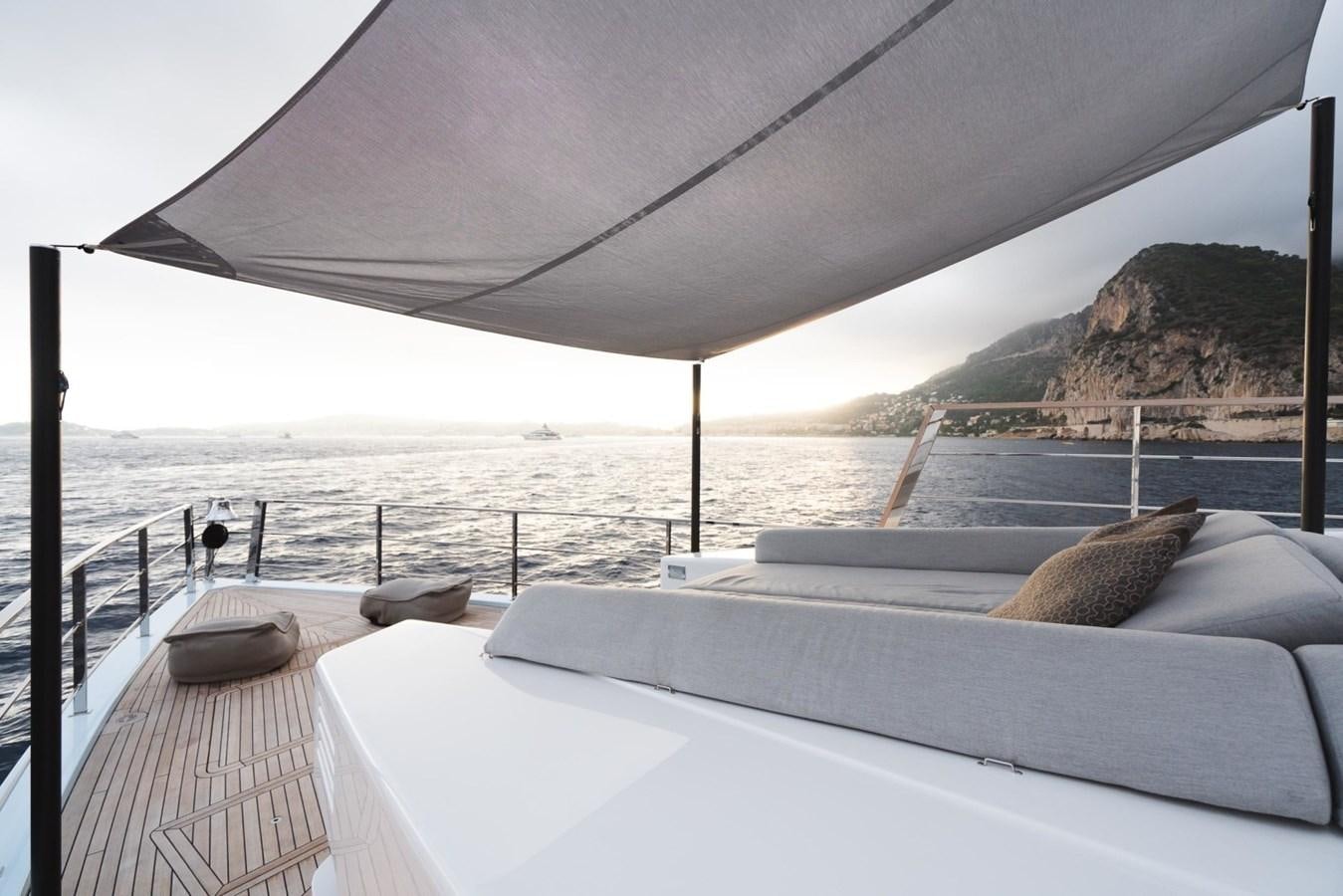 a bed on a deck aboard JESMA II Yacht for Charter