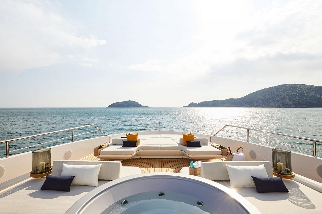 a large white boat on a body of water aboard AZIMUT GRANDE TRIDECK 38M Yacht for Sale