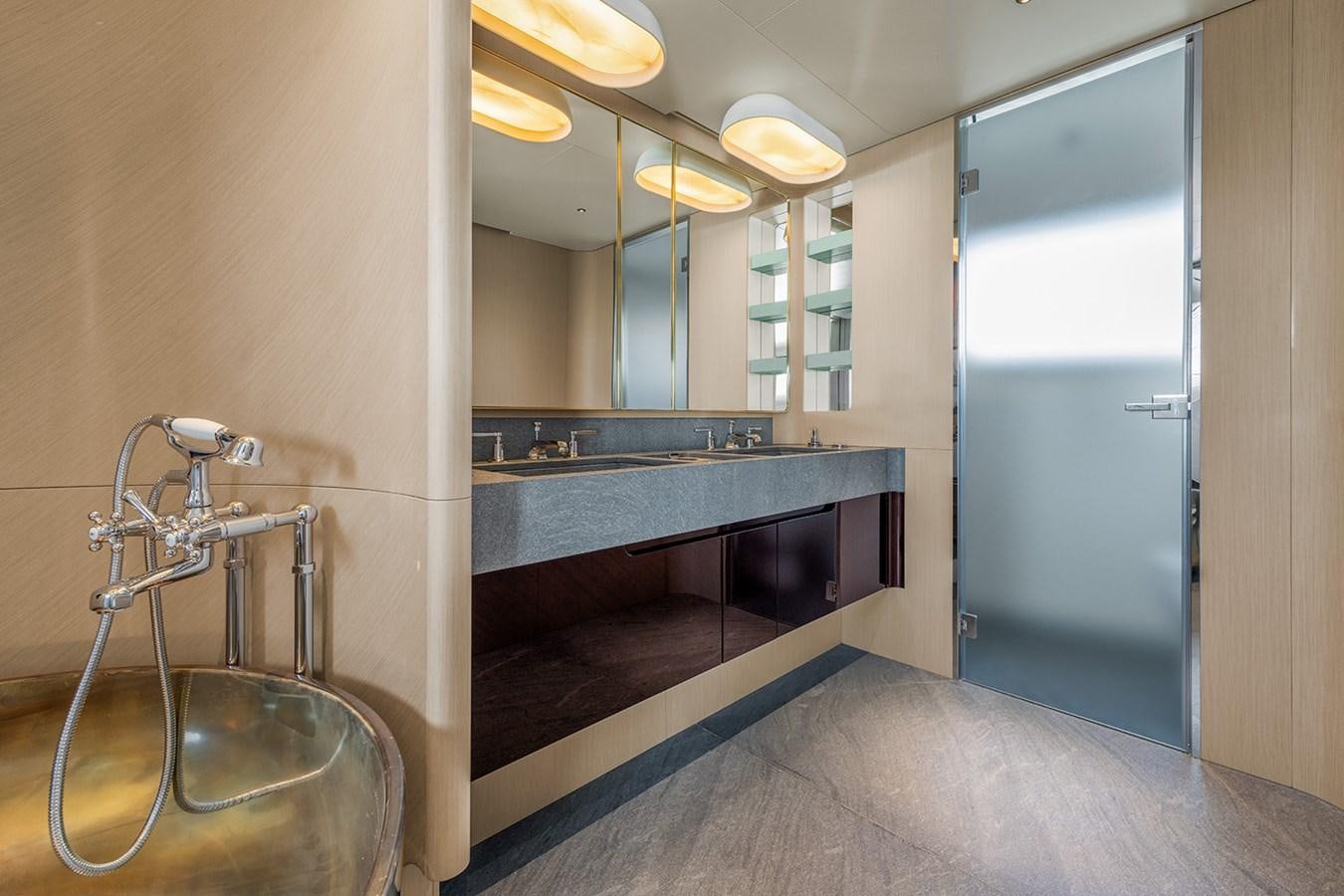 a bathroom with a sink and a shower aboard AZIMUT GRANDE TRIDECK 38M Yacht for Sale