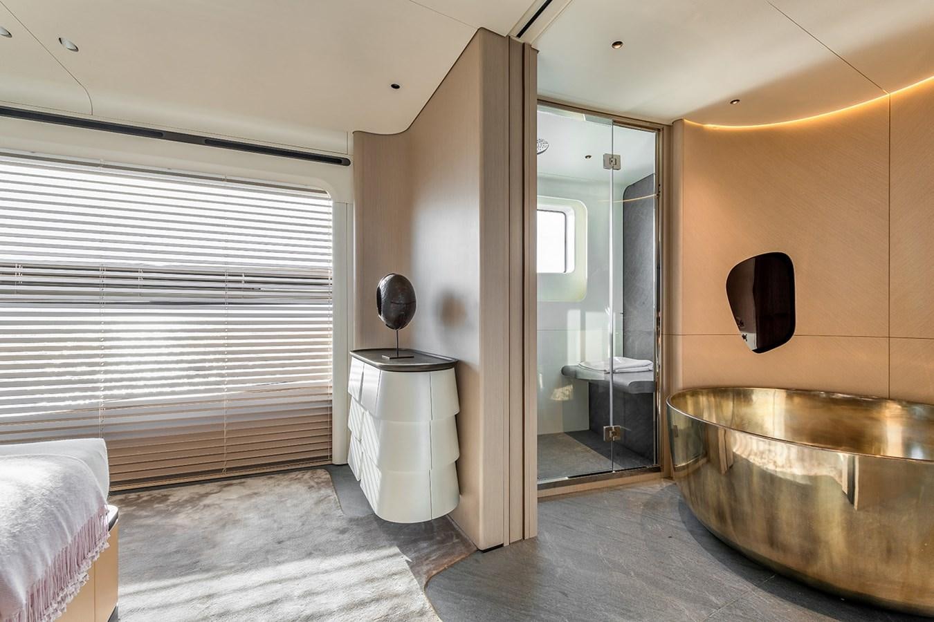 a bathroom with a tub sink and a toilet aboard AZIMUT GRANDE TRIDECK 38M Yacht for Sale