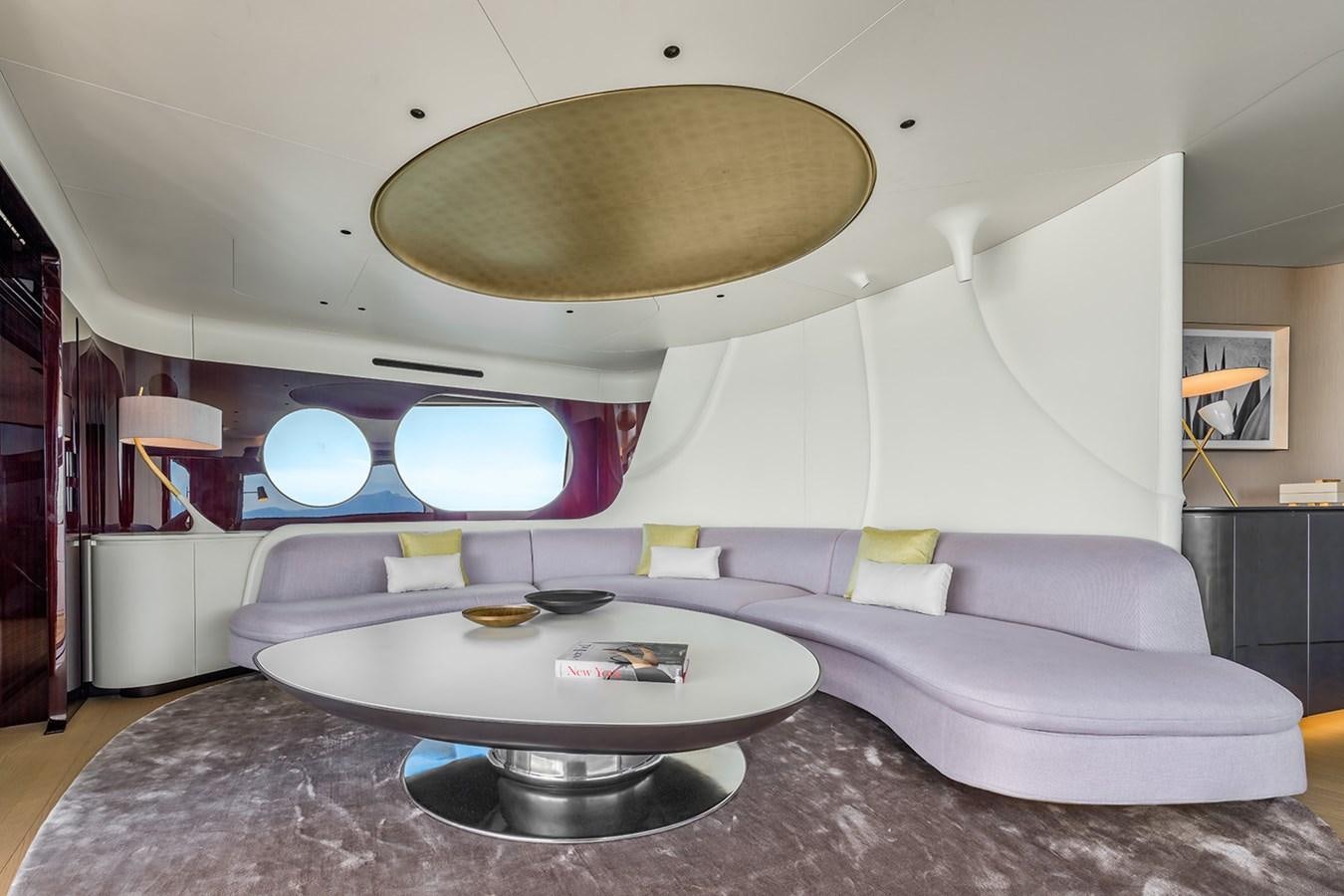a room with a couch and a table aboard AZIMUT GRANDE TRIDECK 38M Yacht for Sale