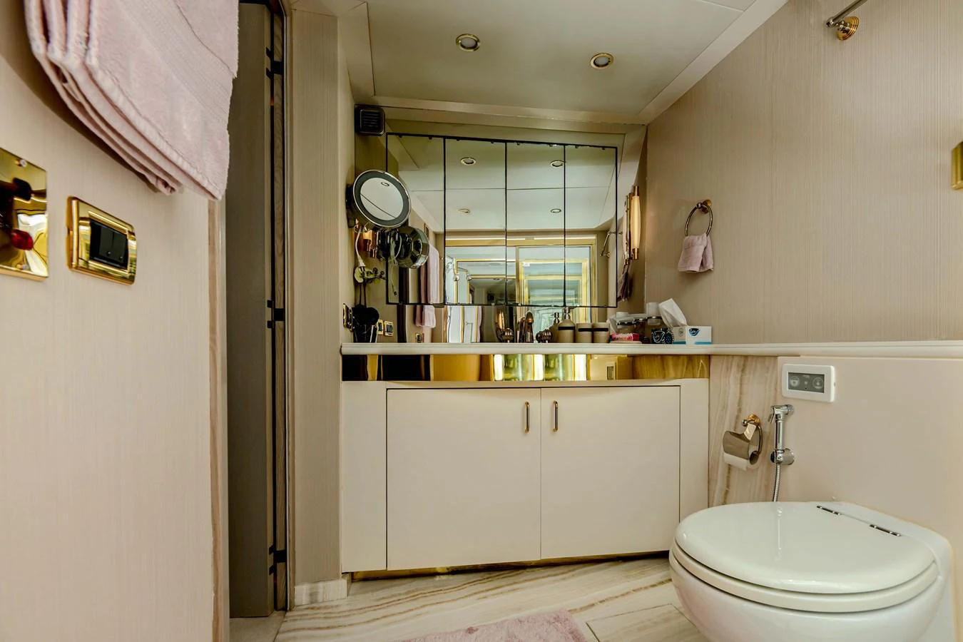 a bathroom with a toilet and a sink aboard WILDE WHALE Yacht for Sale