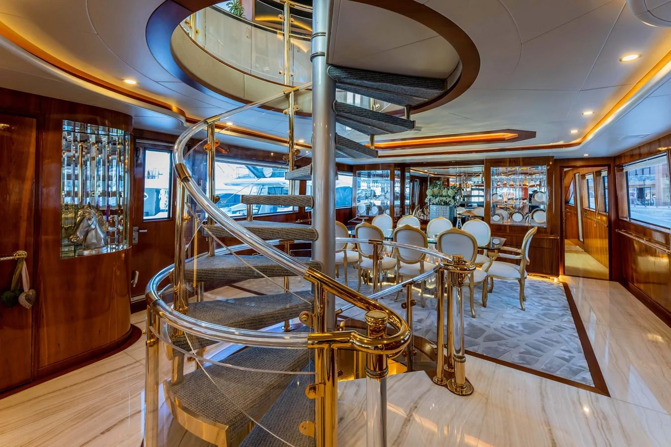 a large room with tables and chairs aboard WILDE WHALE Yacht for Sale