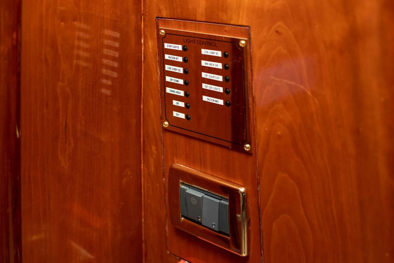 a phone on a wooden wall aboard WILDE WHALE Yacht for Sale