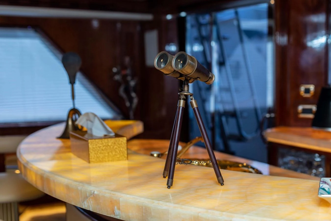 a camera on a table aboard WILDE WHALE Yacht for Sale