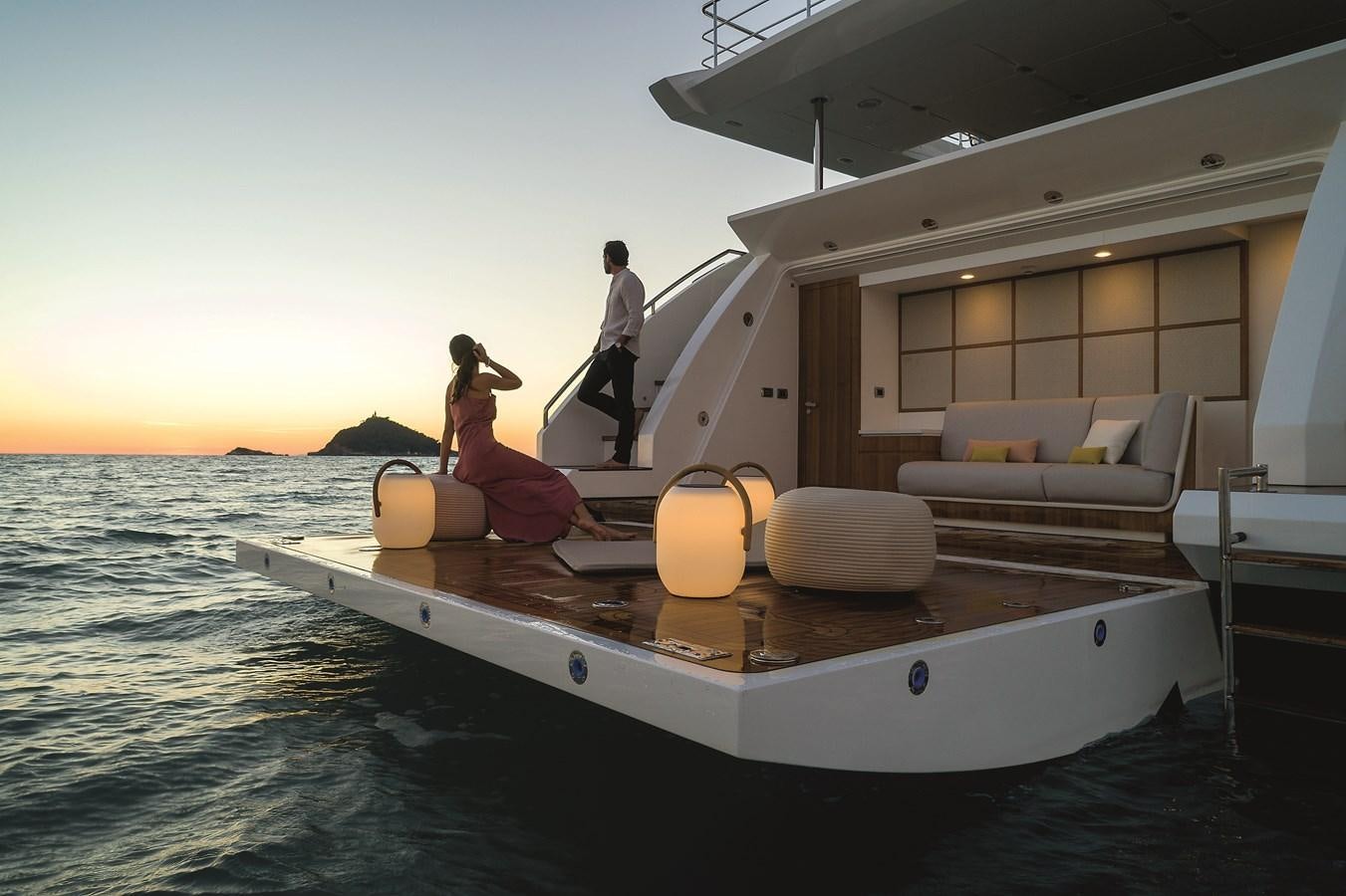 a couple of people on a boat aboard LA MAMA Yacht for Sale