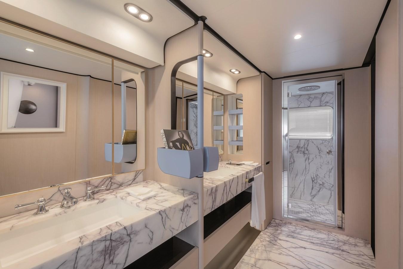 a room with a bed and a mirror aboard LA MAMA Yacht for Sale