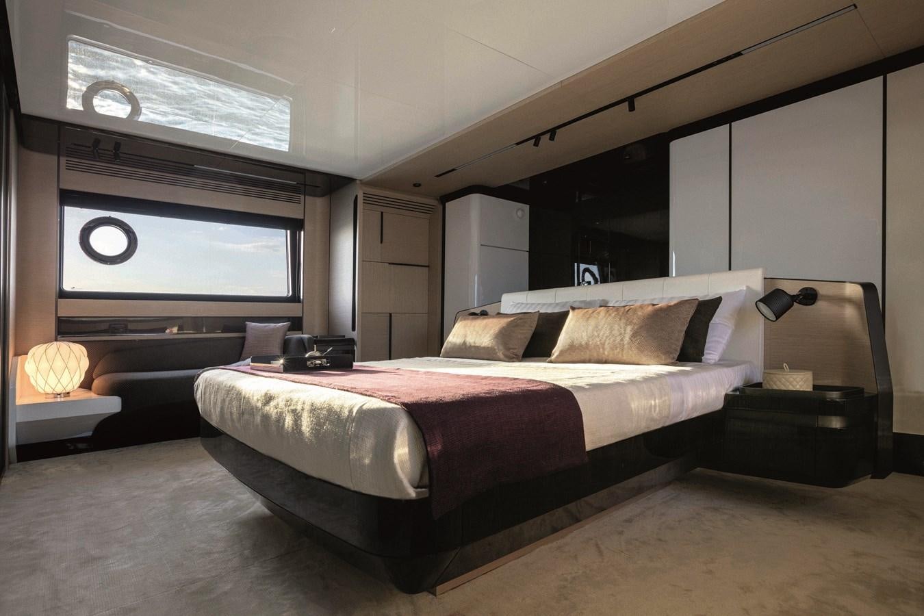 a bed in a room aboard AZIMUT S10/20 Yacht for Sale