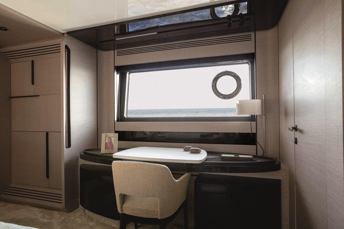 a room with a desk and a large tv aboard AZIMUT S10/20 Yacht for Sale