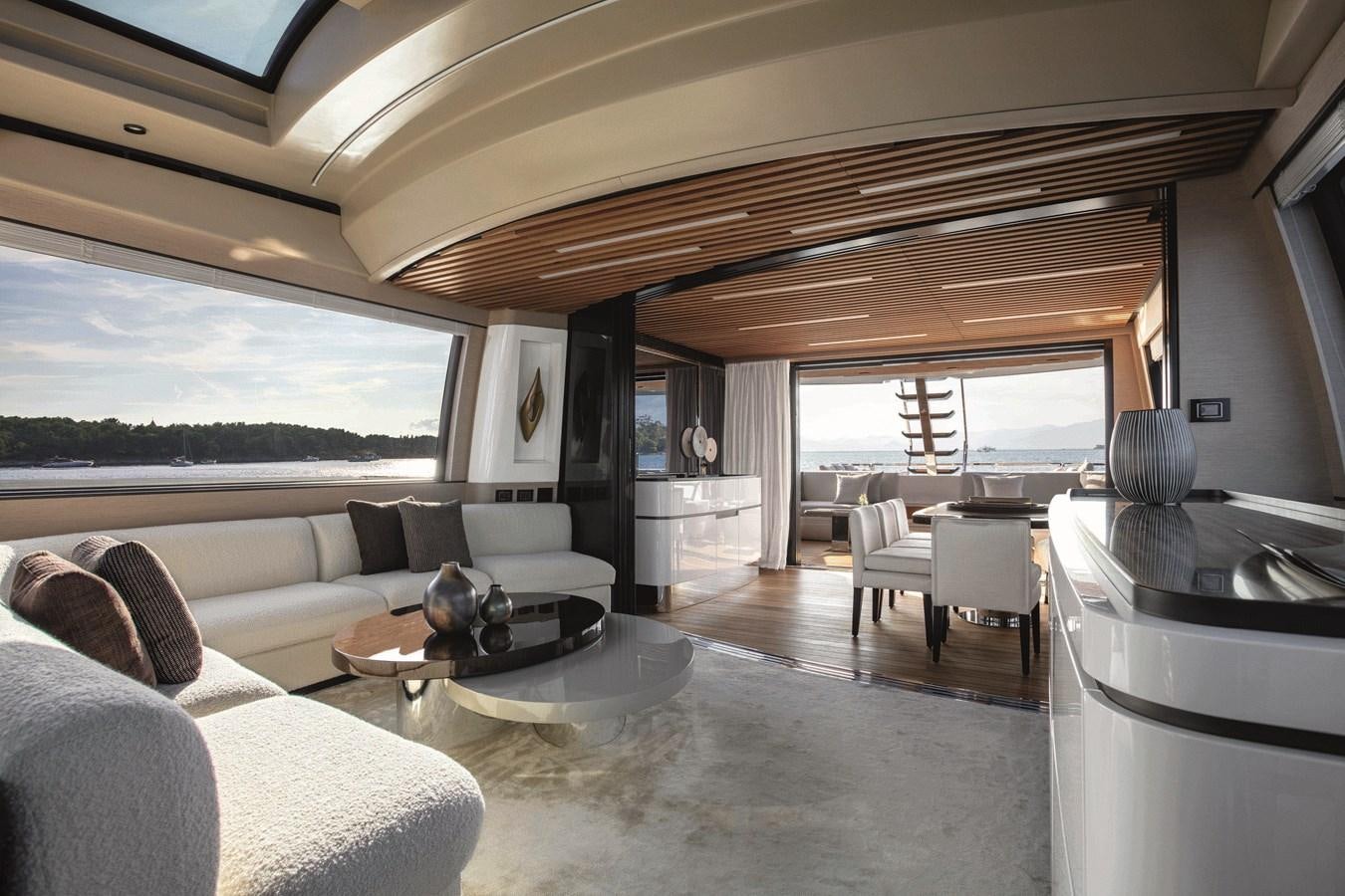a living room with a large window aboard AZIMUT S10/20 Yacht for Sale