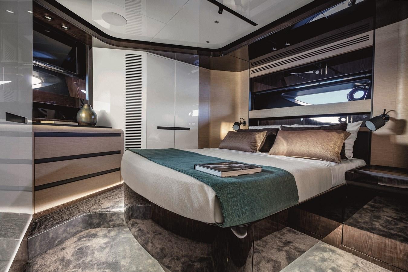 a bed in a room aboard AZIMUT S10/20 Yacht for Sale