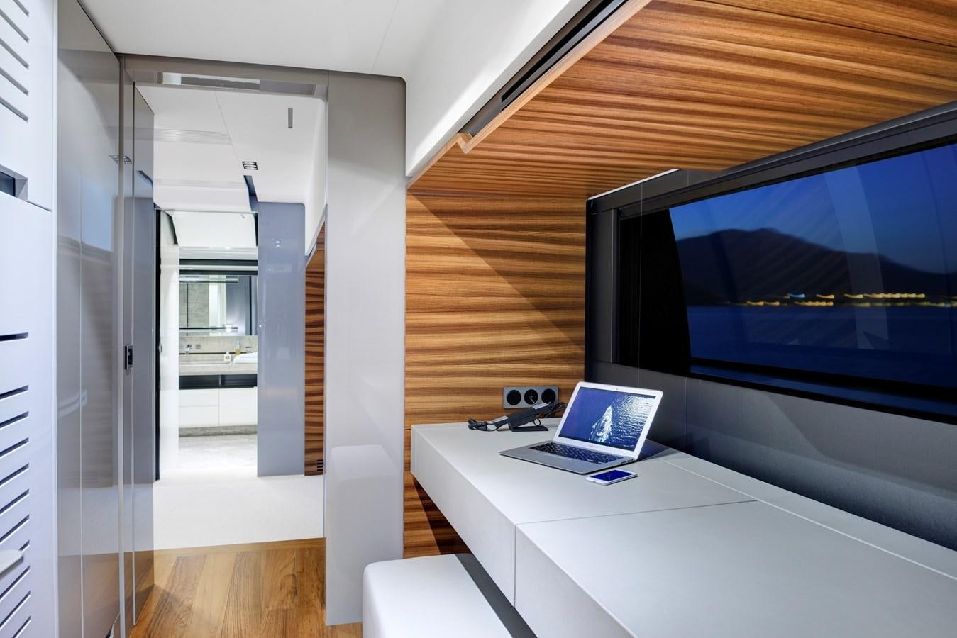 a room with a large screen aboard FX Yacht for Charter
