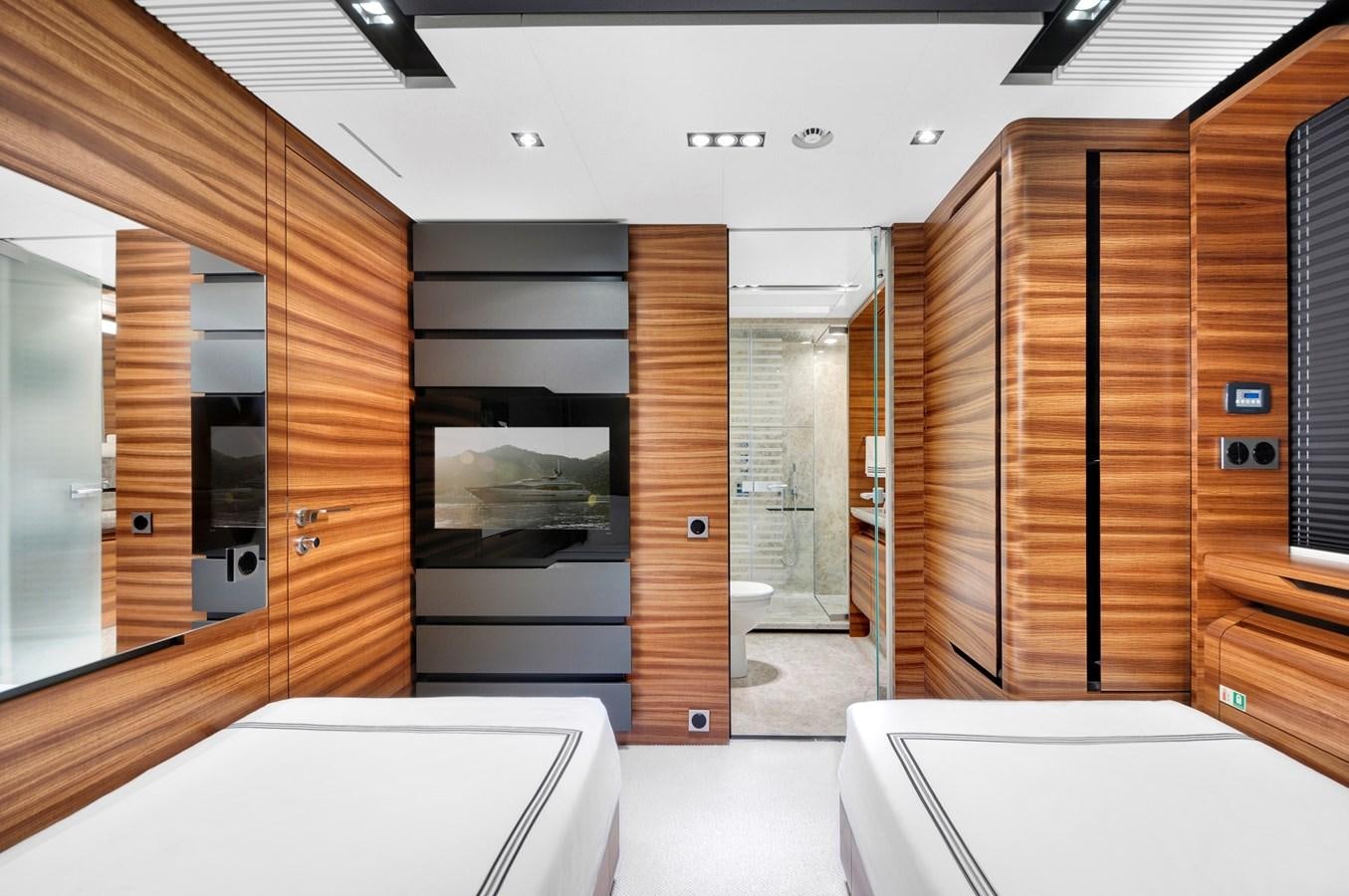 a room with wooden cabinets aboard FX Yacht for Sale
