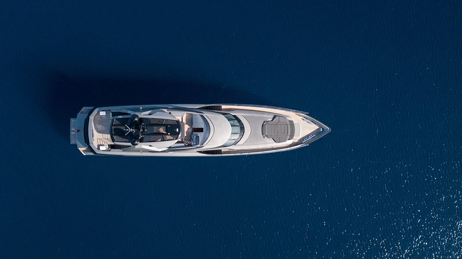 a silver and blue car aboard FX Yacht for Sale