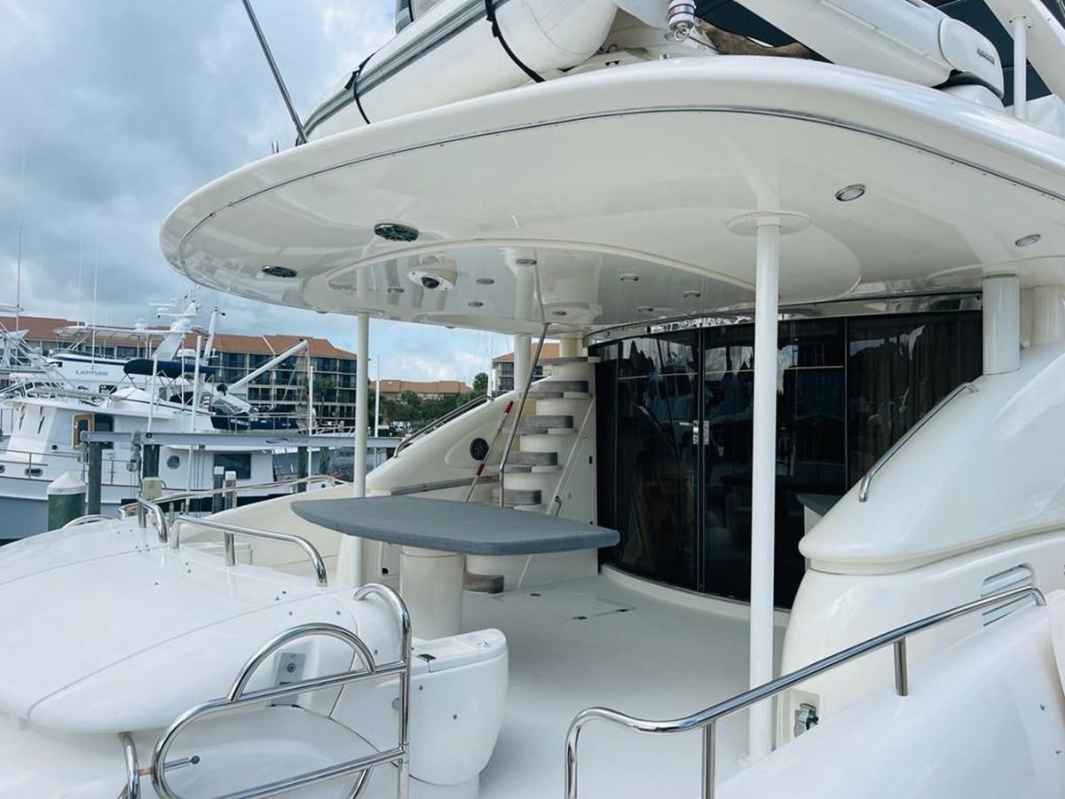 a boat with a white canopy aboard LADY ESTHER  Yacht for Sale