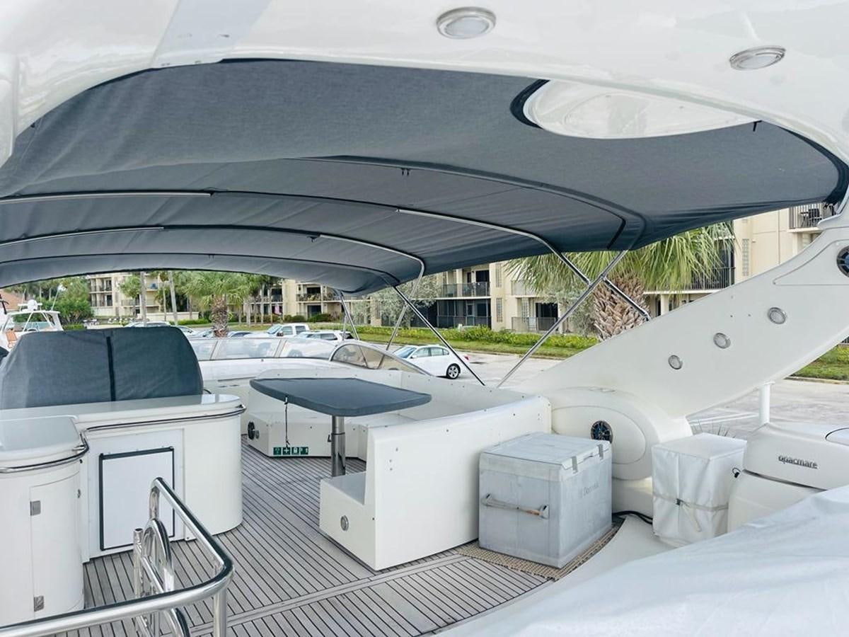 a white tent with a solar panel aboard LADY ESTHER  Yacht for Sale