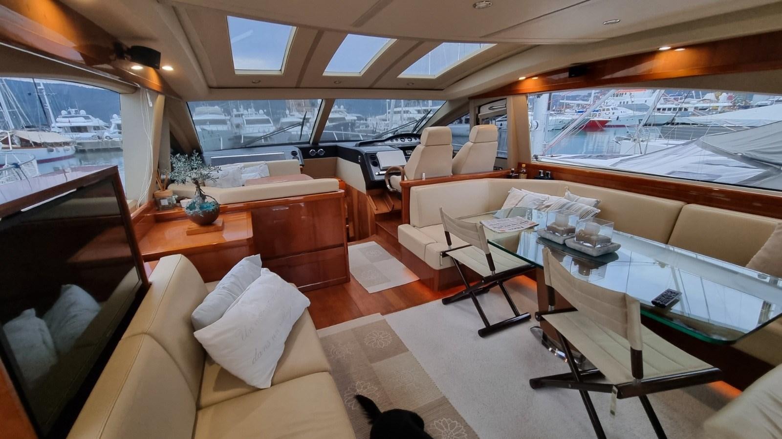 a room with a view of the ocean and the deck aboard SERENA Yacht for Sale