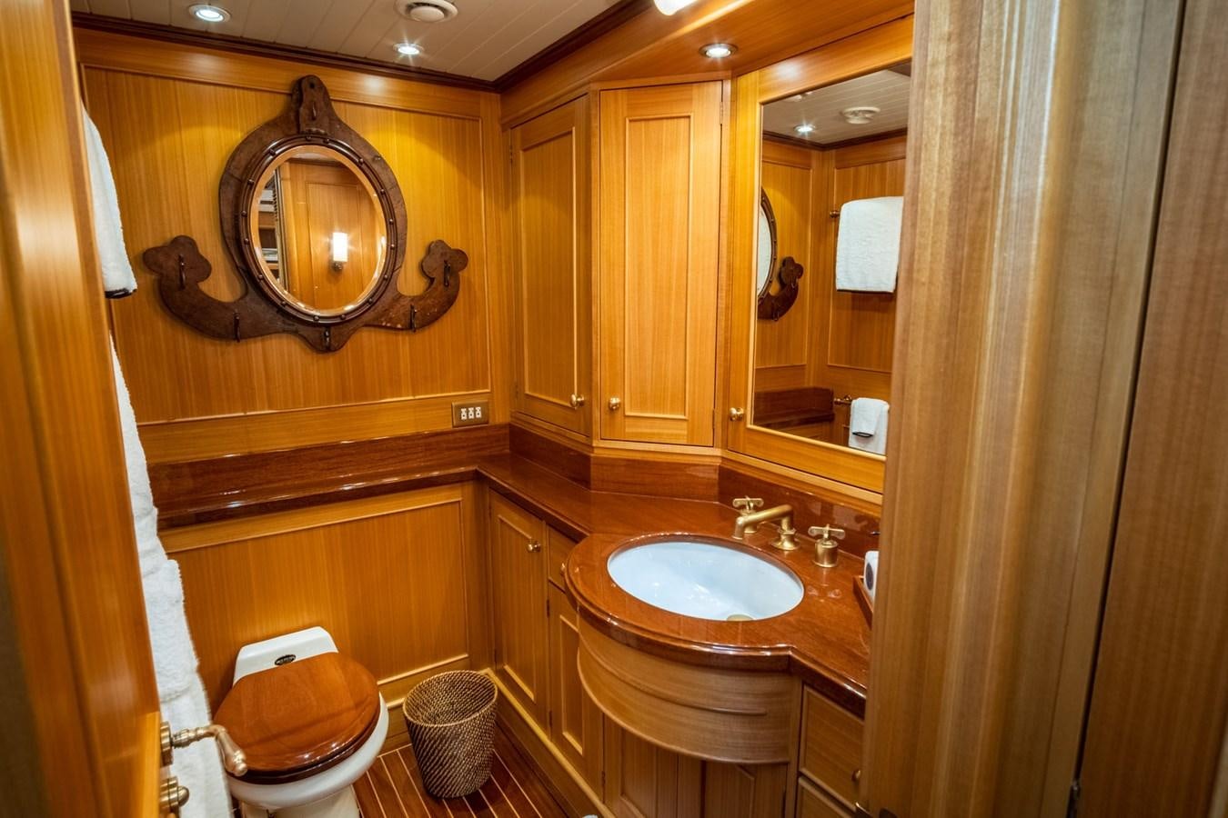 a bathroom with a sink and toilet aboard FORTUNA Yacht for Sale