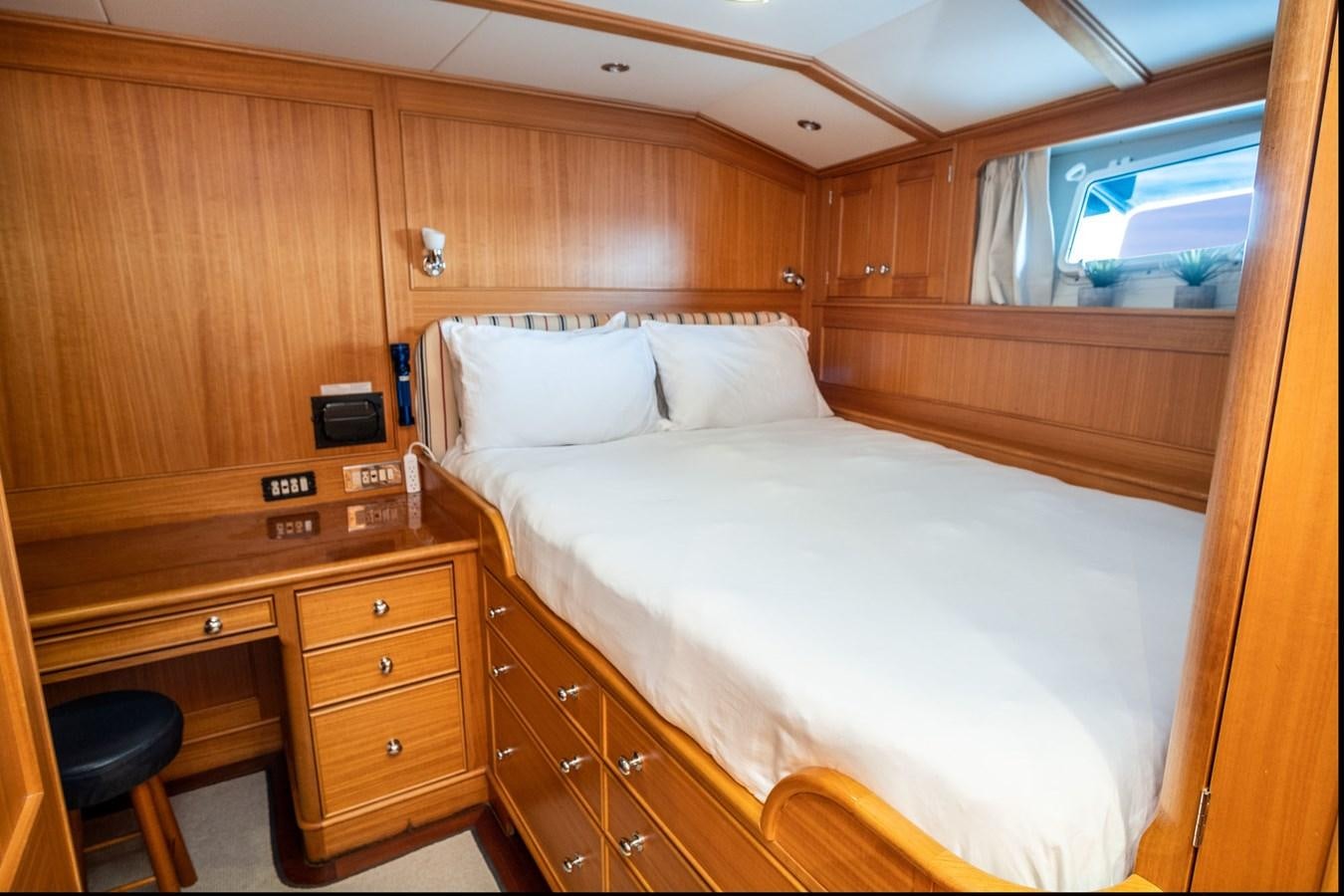 a bed in a cabin aboard FORTUNA Yacht for Sale