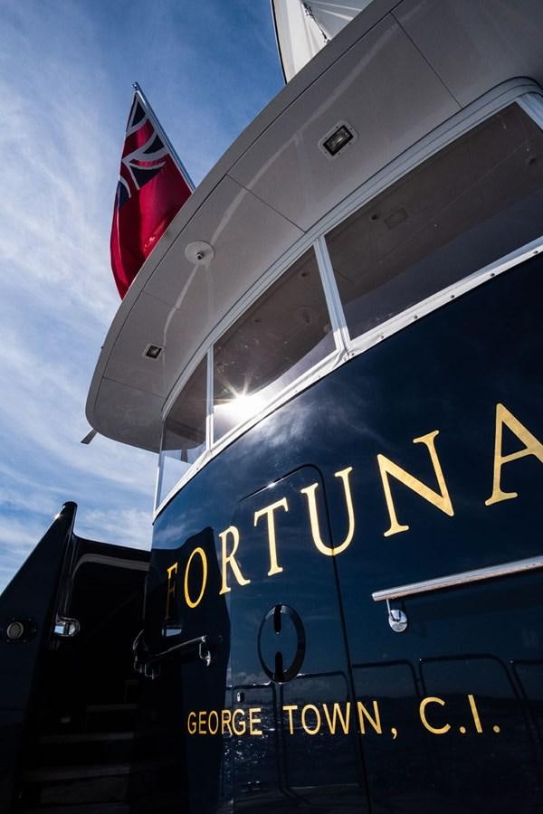 a sign on a building aboard FORTUNA Yacht for Sale