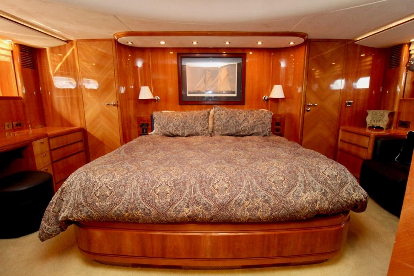 a bed in a room aboard AVICCI Yacht for Sale