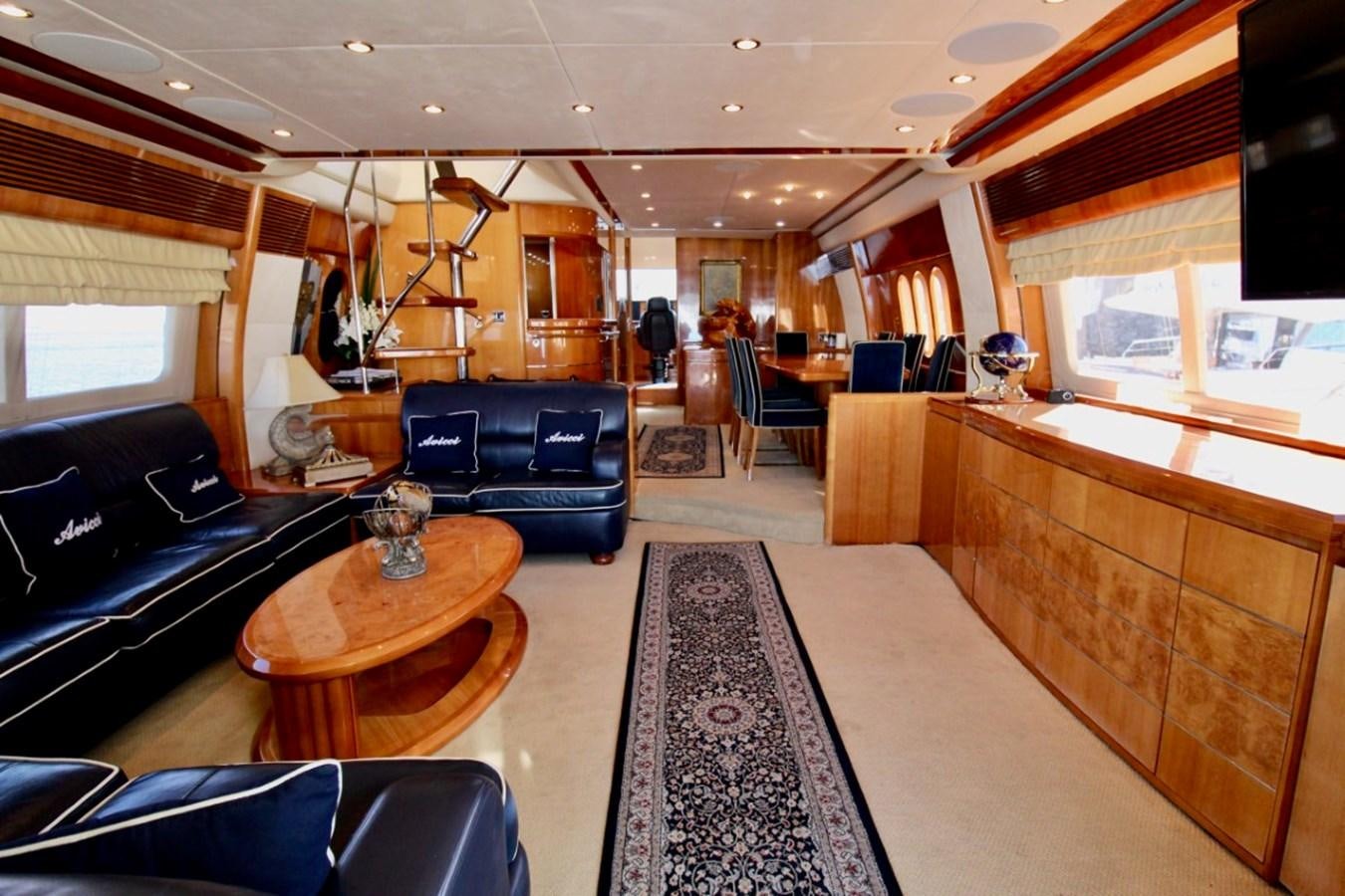 a living room with a large window aboard AVICCI Yacht for Sale