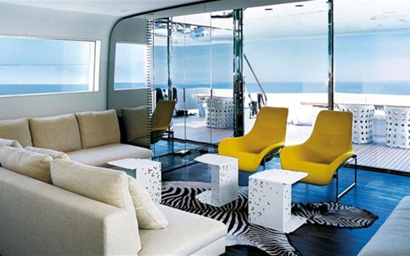 a living room with a large window aboard PAB Yacht for Sale