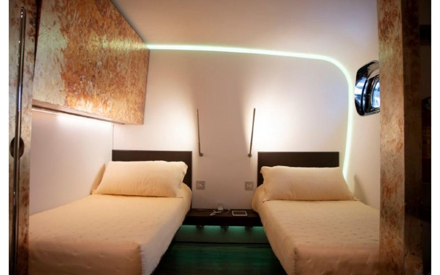 a room with two beds aboard PAB Yacht for Sale