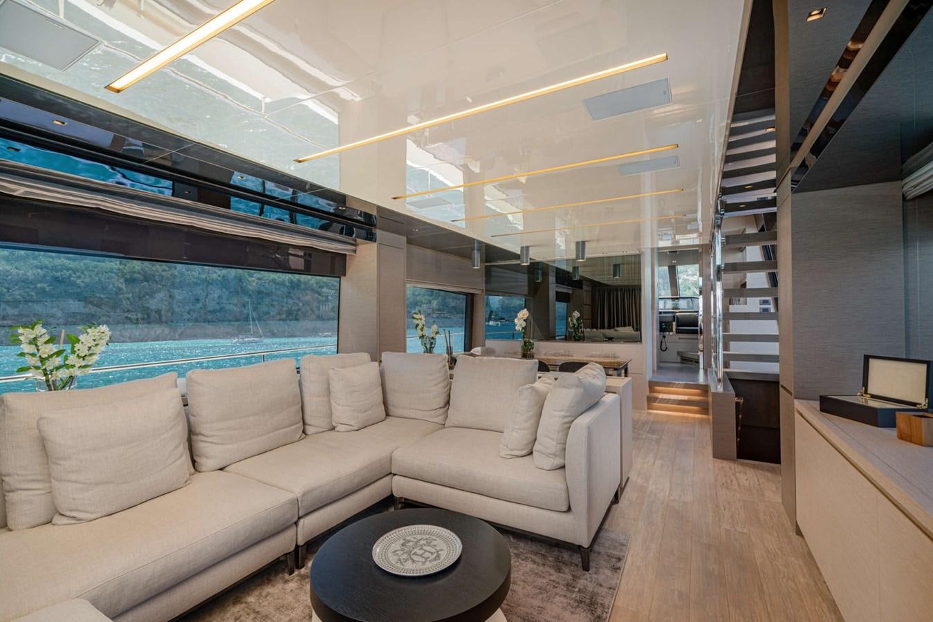 a living room with a large window aboard LUCKY Yacht for Sale