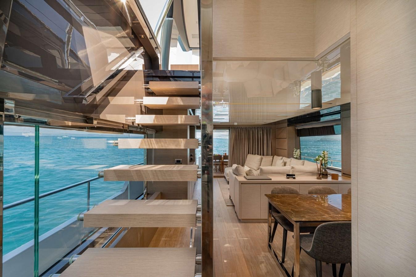 a modern looking living room with a pool aboard LUCKY Yacht for Sale