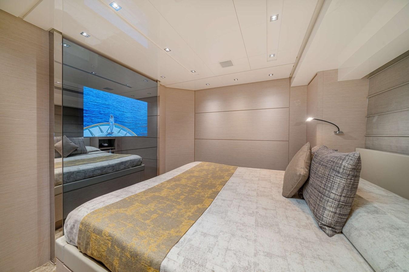 a bed in a room aboard LUCKY Yacht for Sale