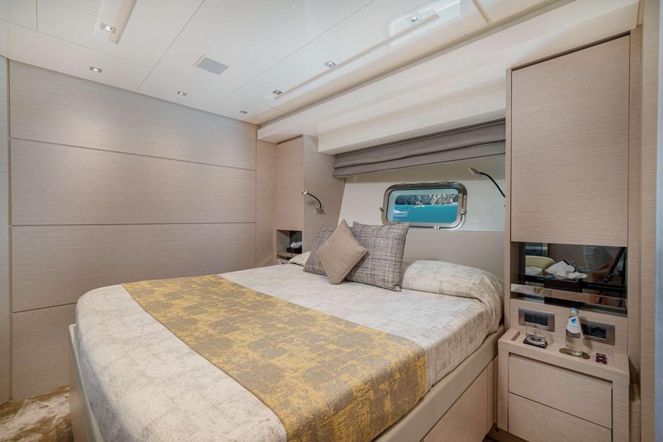 a bed in a room aboard LUCKY Yacht for Sale