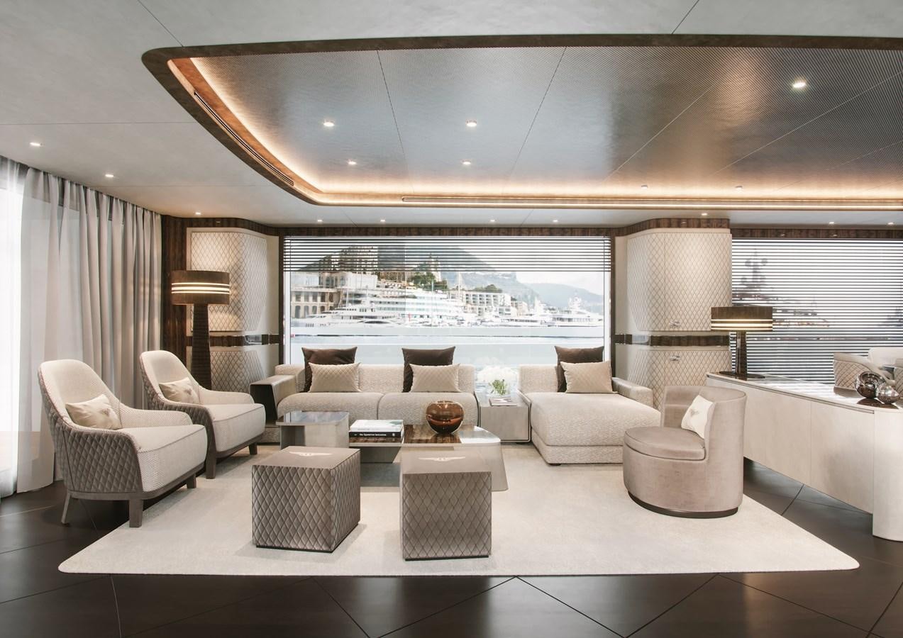 a living room with a large window aboard DYNAMIQ GLOBAL 400 Yacht for Sale