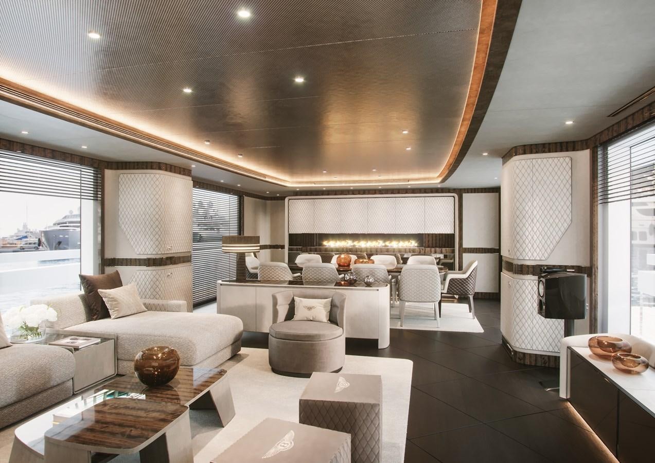 a living room with a large window aboard DYNAMIQ GLOBAL 400 Yacht for Sale