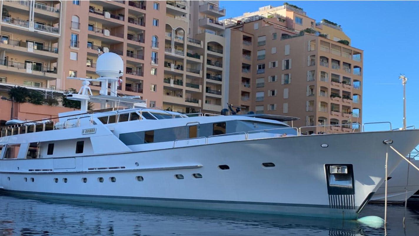 a large white boat in the water aboard BAHIRA II Yacht for Sale