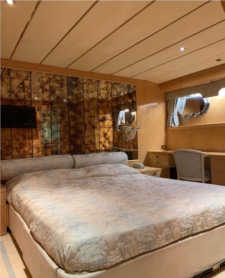 a large bed in a room aboard BAHIRA II Yacht for Sale