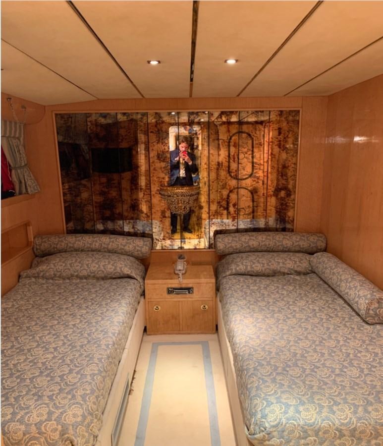 a room with a couch and a table aboard BAHIRA II Yacht for Sale